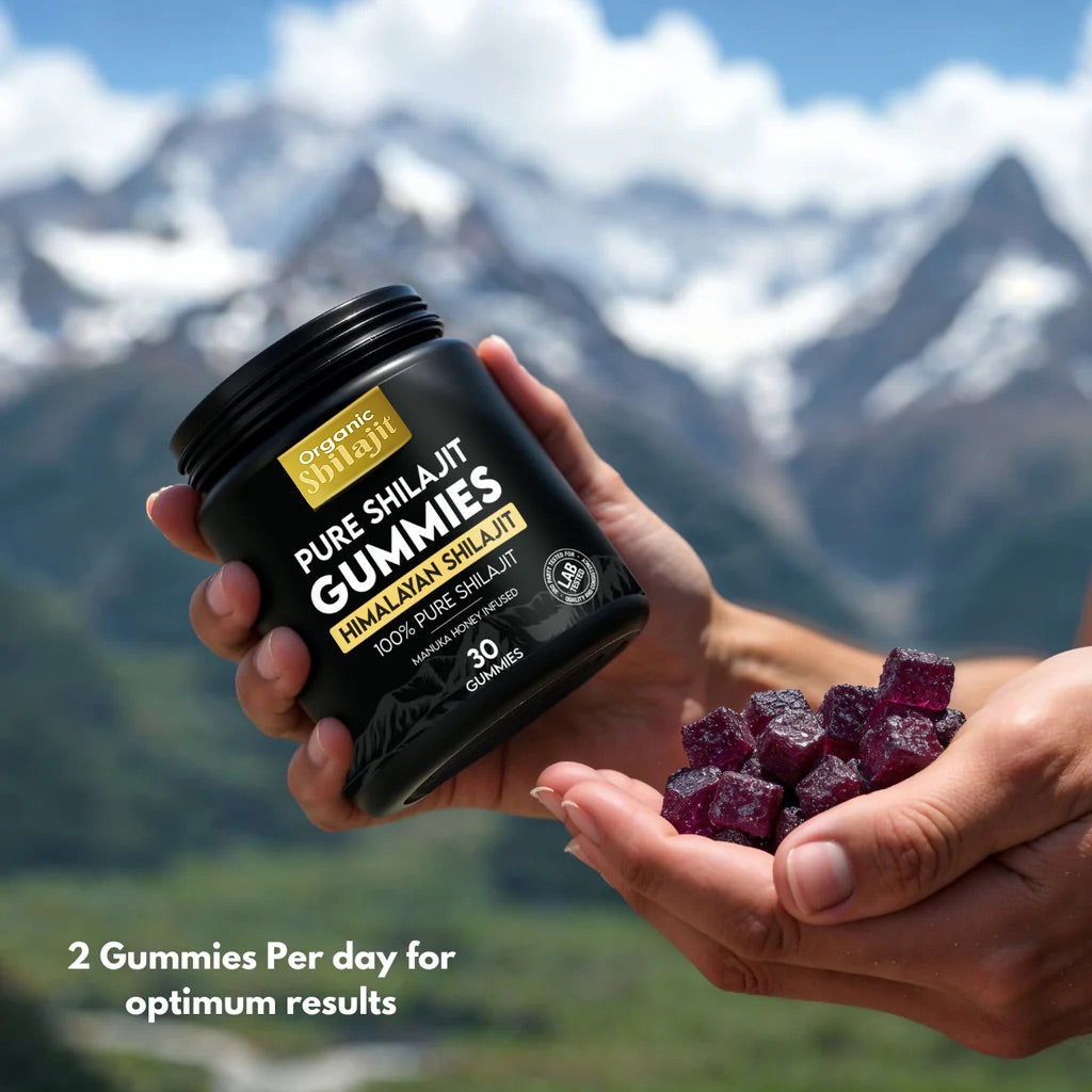 A person holding a jar of Pure Himalayan Shilajit Gummies with mountains in the background, promoting wellness and energy.